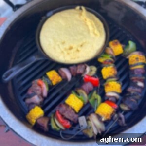 12 Steps to Mastering Your Big Green Egg's Ultimate Accessory 8 steak kabobs cooking on a big green egg