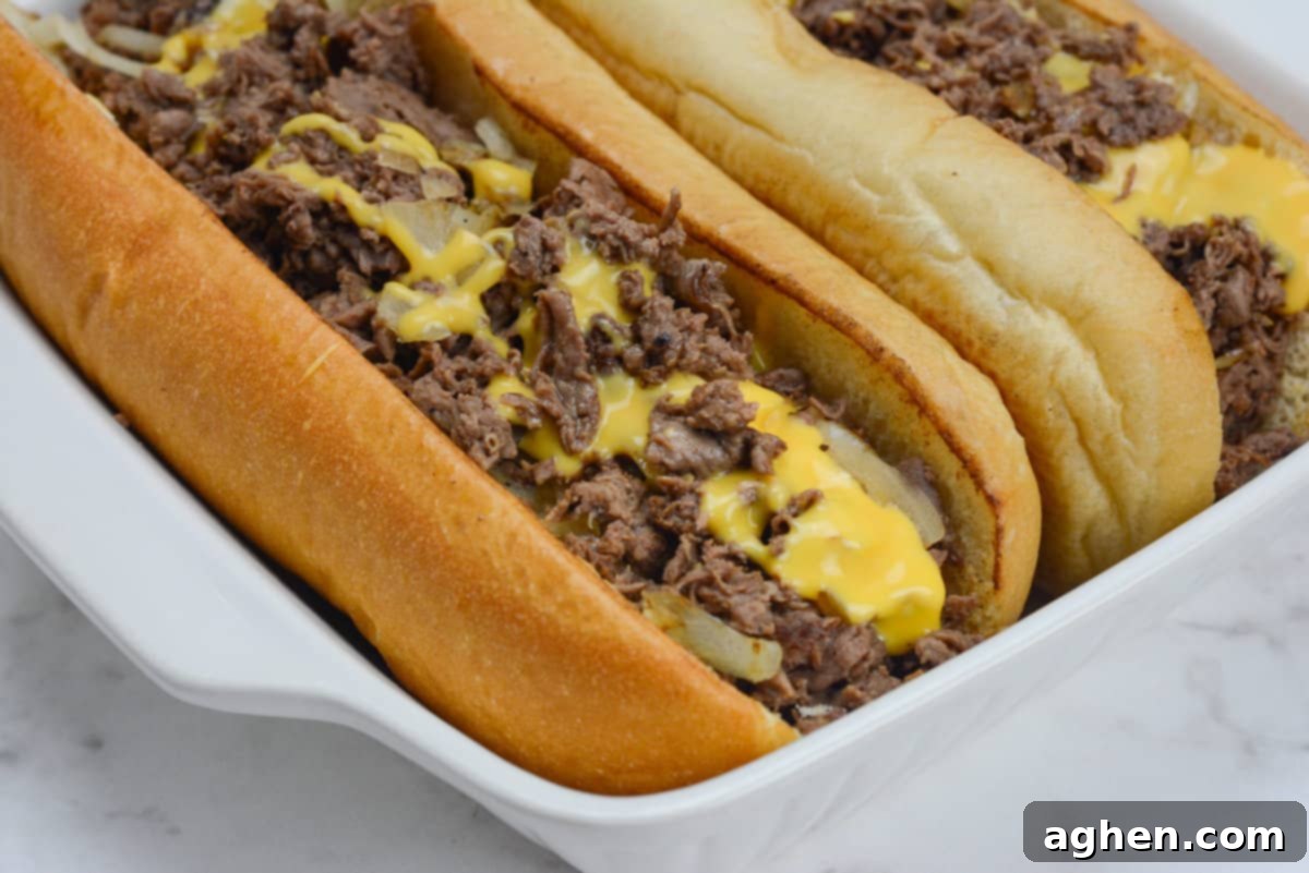 Make The Perfect Blackstone Philly Cheesesteak Every Time 2 Sizzling Blackstone Philly Cheesesteaks fresh off the griddle.