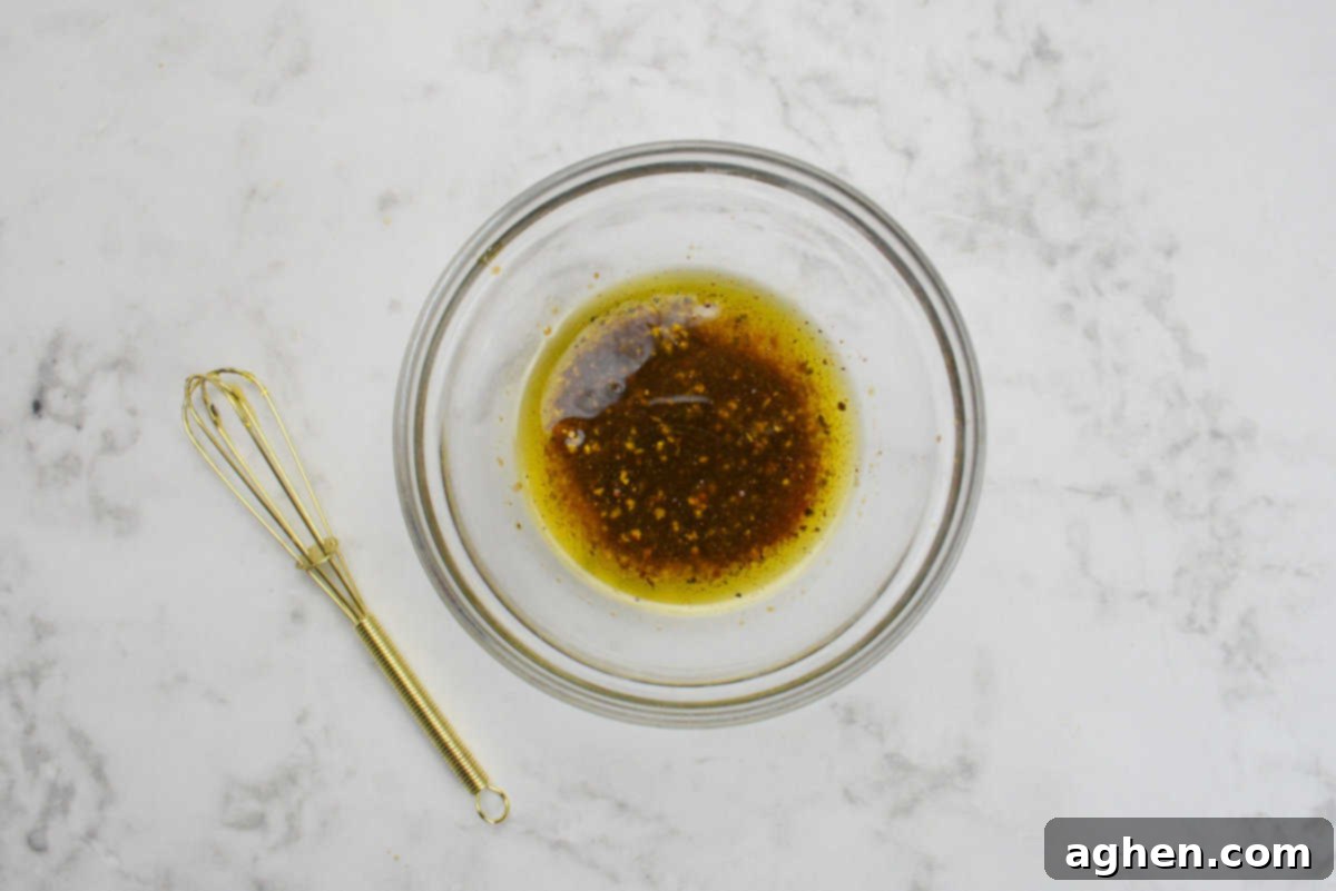 Make The Perfect Blackstone Philly Cheesesteak Every Time 4 Ingredients for Blackstone Philly Cheesesteaks marinade in a bowl.