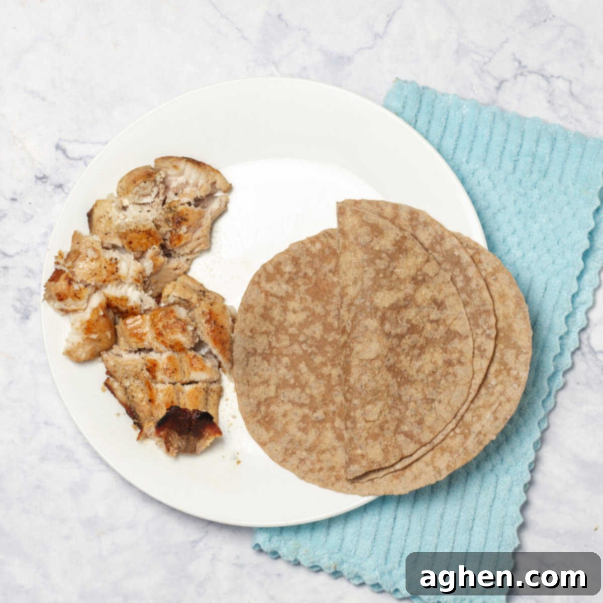 Effortlessly Delicious Weight Watchers Fish Tacos 6 tortilla with strips of the cooked fish