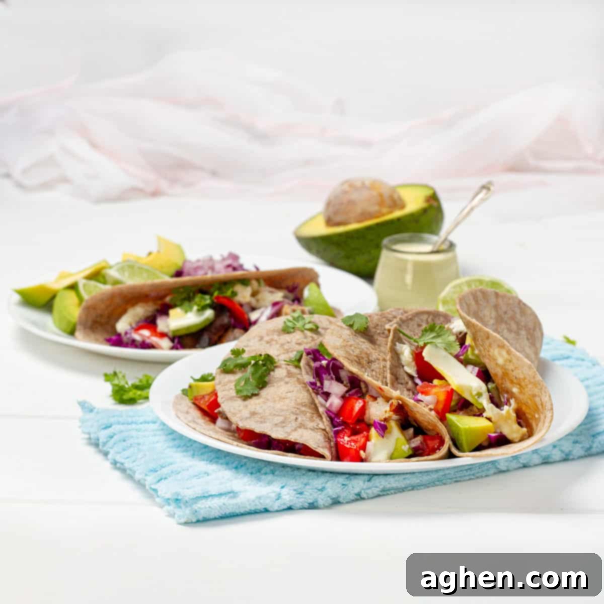 Effortlessly Delicious Weight Watchers Fish Tacos 8 Fish Tacos plated with Yogurt Sauce