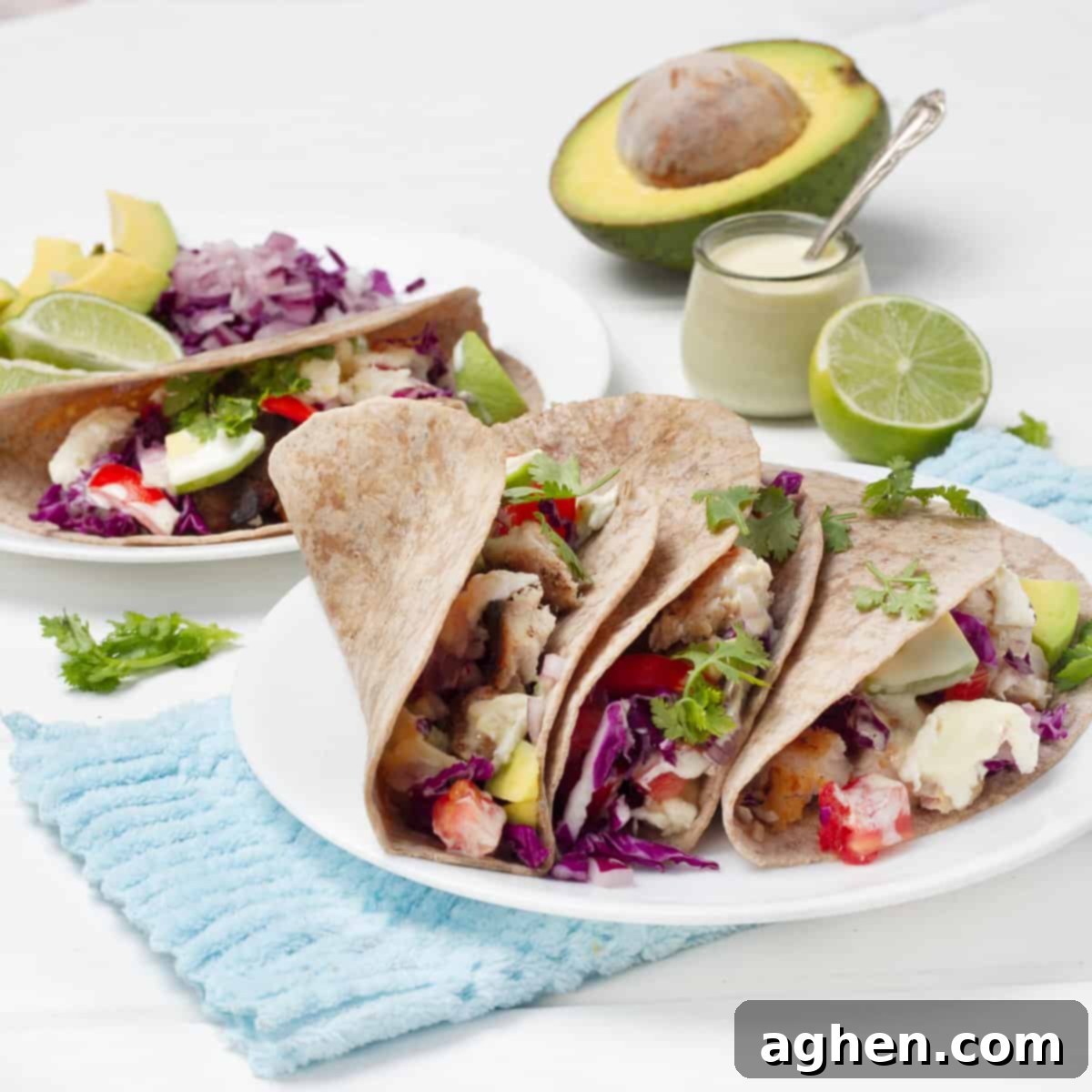 Effortlessly Delicious Weight Watchers Fish Tacos 9 Fish Tacos plated with Yogurt Sauce