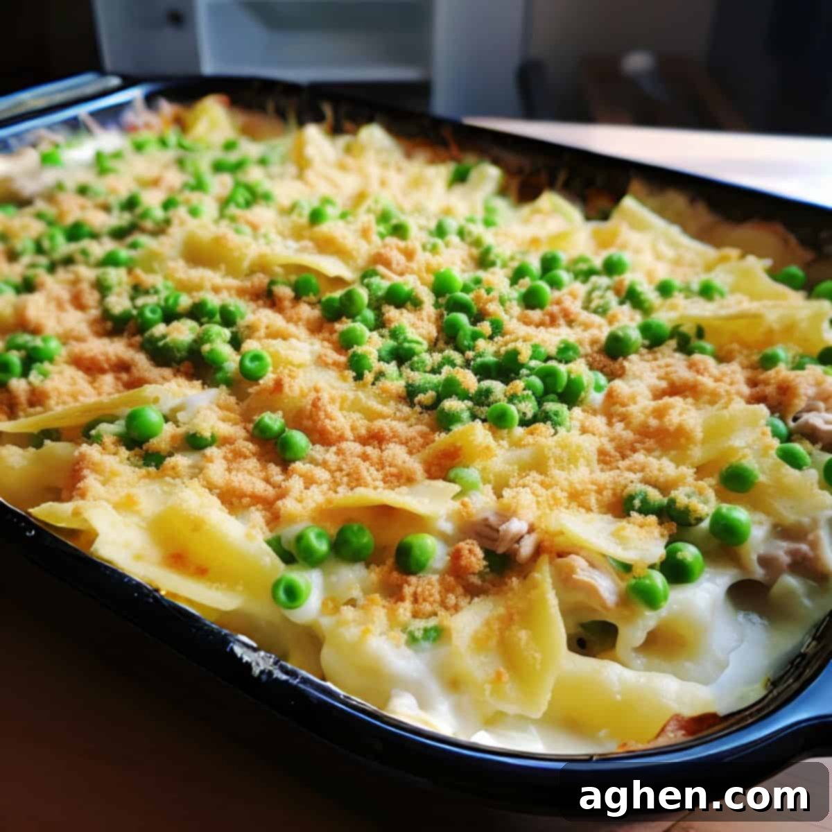 Deliciously Guilt-Free Weight Watchers Tuna Casserole 2 Classic tuna casserole in a black casserole dish, ready to serve