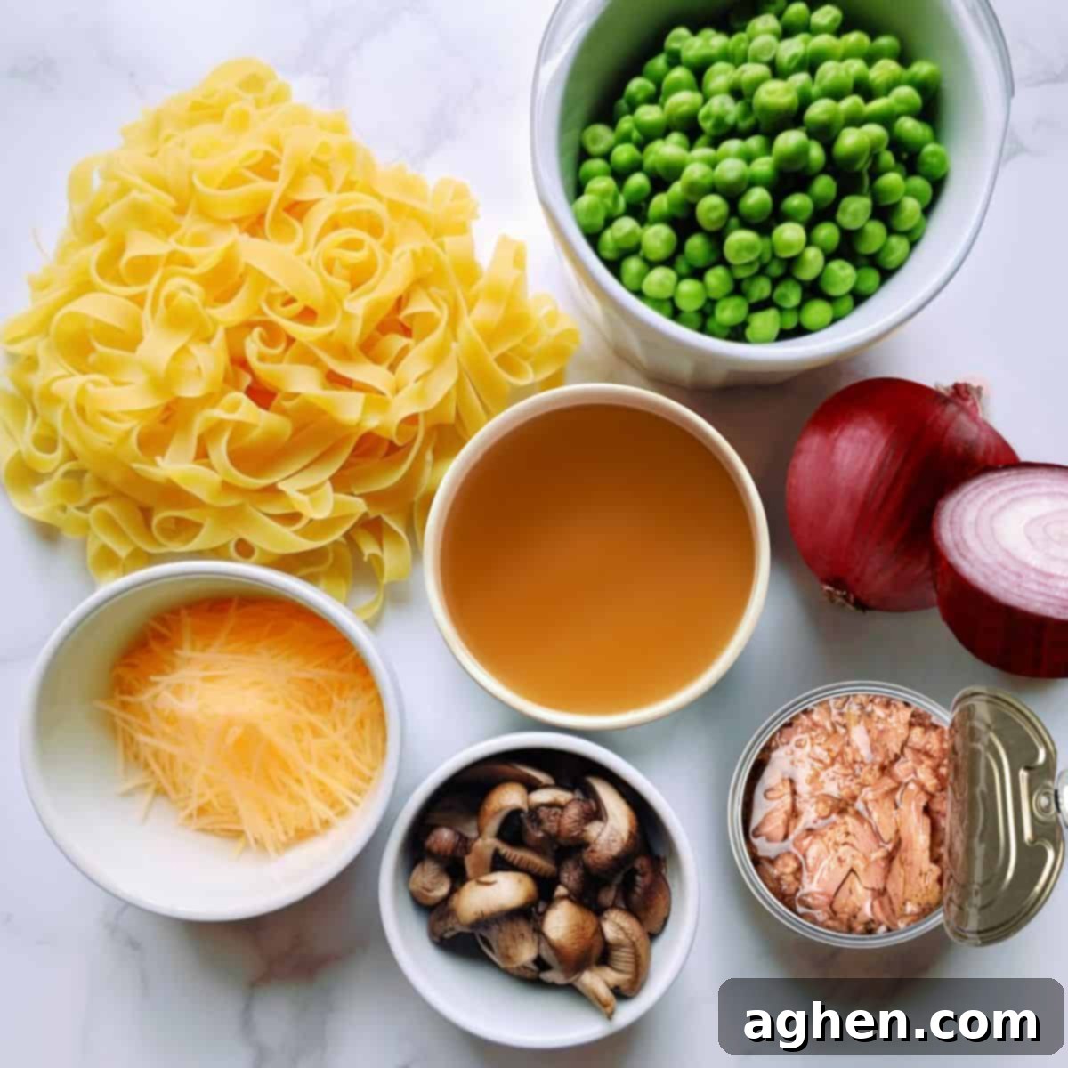 Deliciously Guilt-Free Weight Watchers Tuna Casserole 3 Ingredients for healthy tuna casserole laid out on a white cutting board