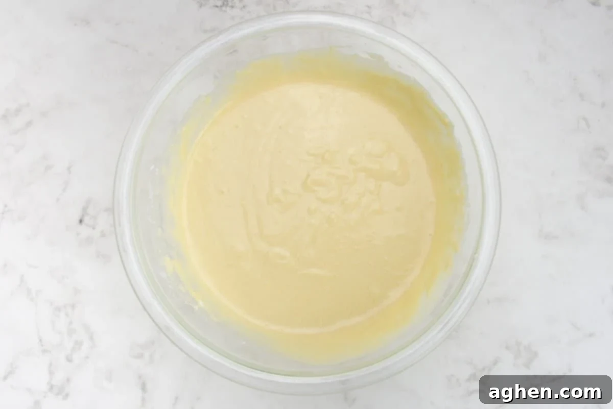 Blackstone Pancake Perfection: Your Ultimate Guide 7 smooth blackstone pancakes batter with all ingredients mixed in