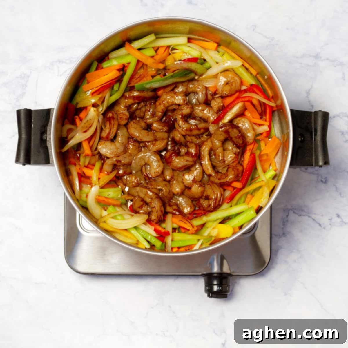 Shrimp Garden Medley 8 Marinated shrimp added to one side of the skillet, cooking alongside the colorful vegetables.