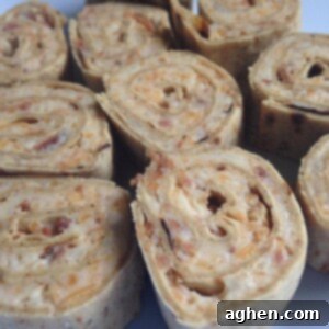 Golden Cheese Swirls 2 Plate of high-protein cheesy bacon roll-ups
