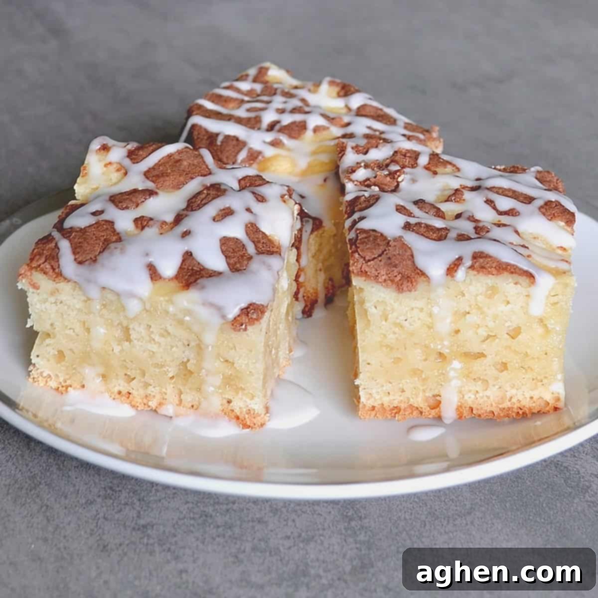 Indulge in Slow Cooker Coffee Cake The Weight Watchers Way 2 Three slices of coffee cake, one with a fork, showing the moist crumb and streusel topping.