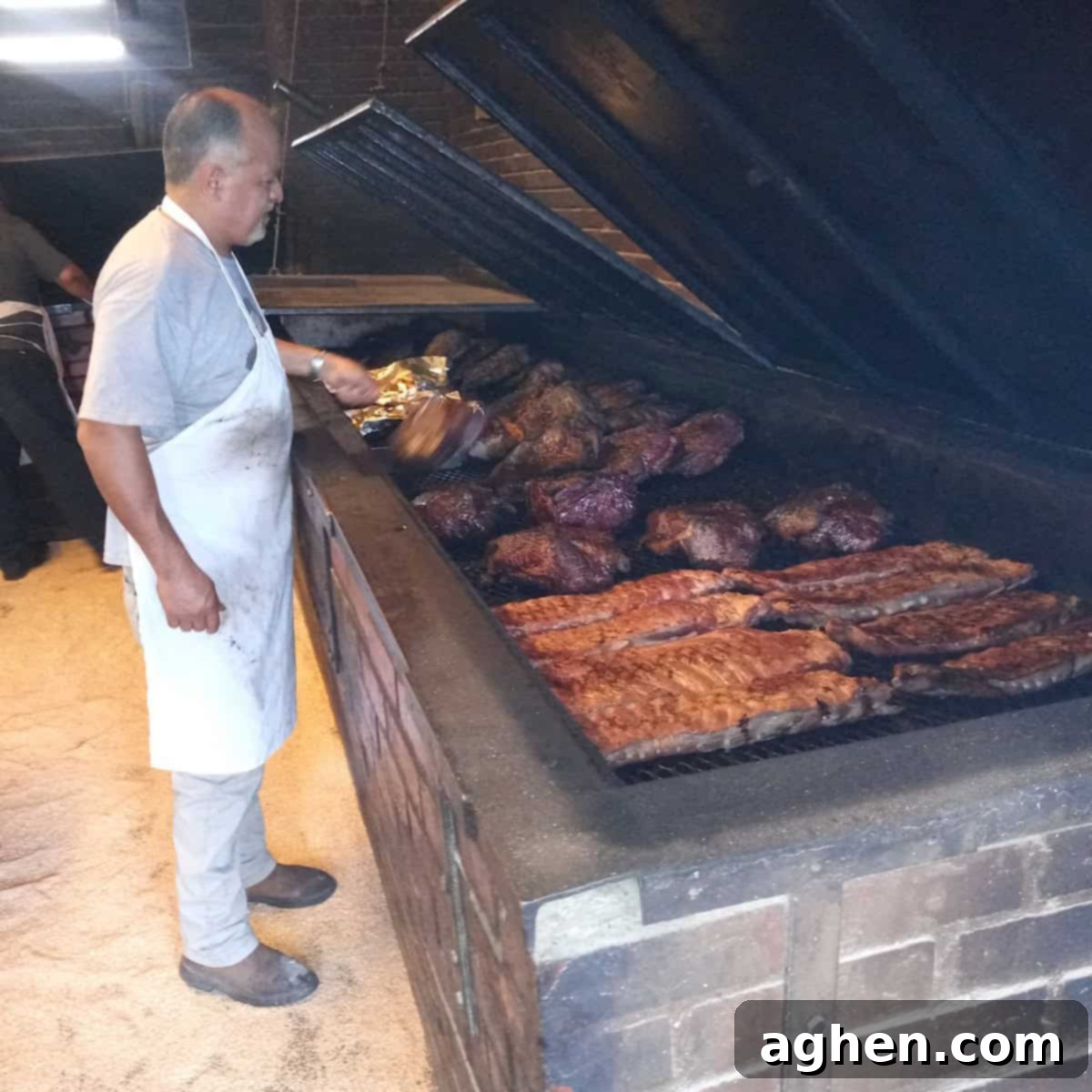 Before You Buy an Offset Smoker: 10 Critical Facts (And Yes, It's Enormous!) 4 man cooking on giant grill