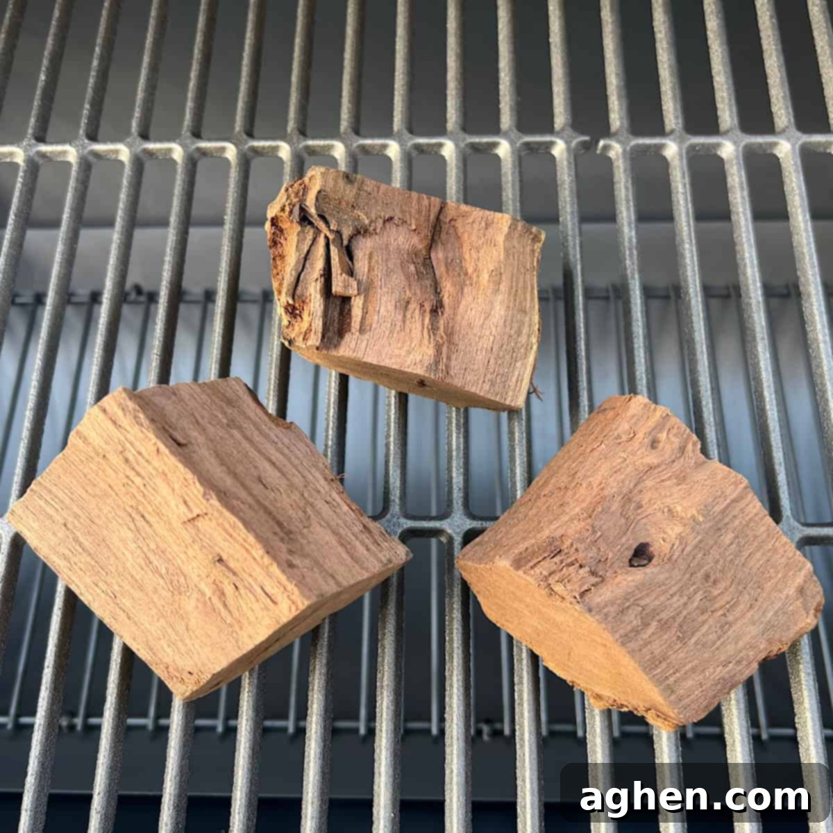 Before You Buy an Offset Smoker: 10 Critical Facts (And Yes, It's Enormous!) 9 wood chunks sitting on grill