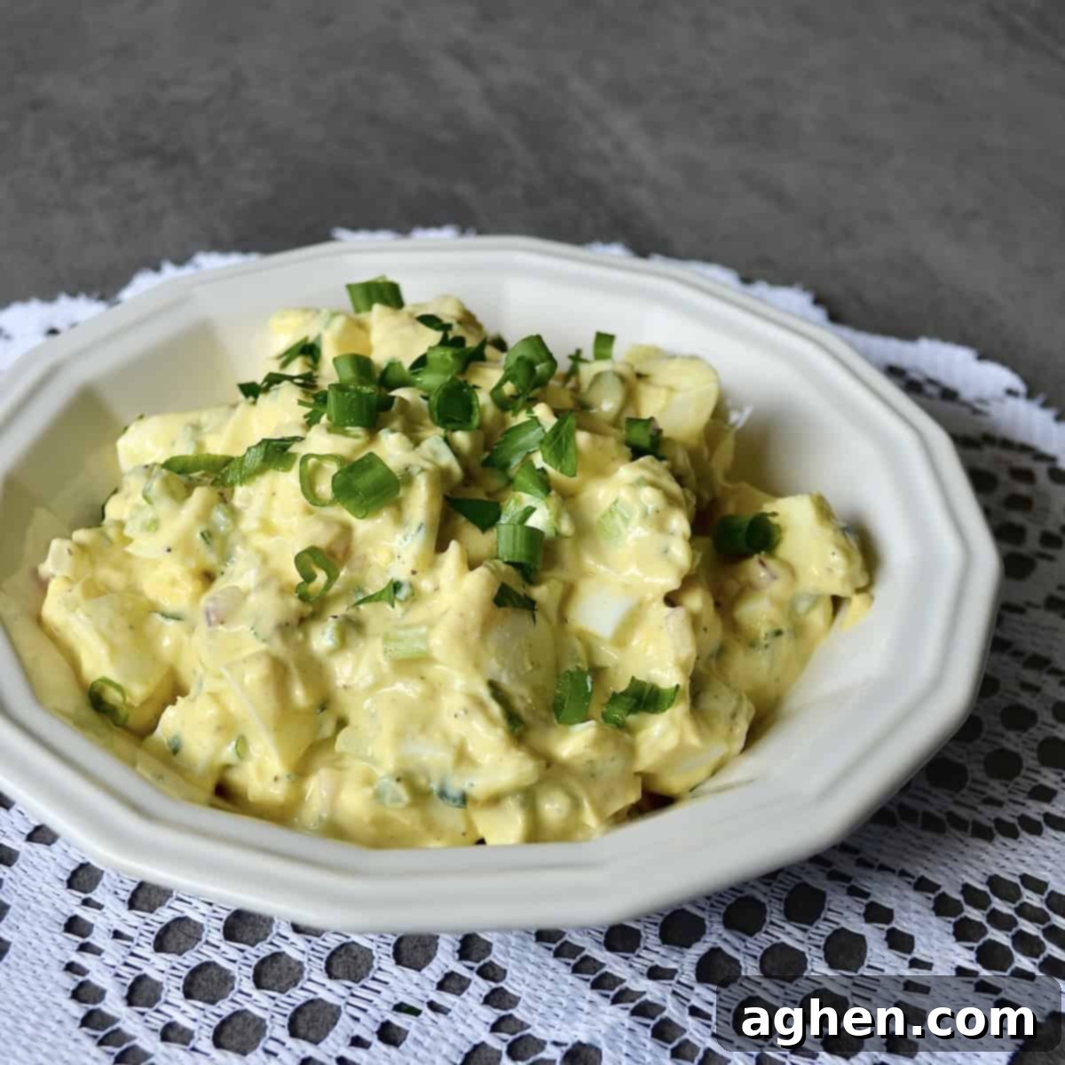 Light & Creamy Weight Watchers Egg Salad 2 Bowl of healthy Greek yogurt egg salad with fresh green onions for garnish