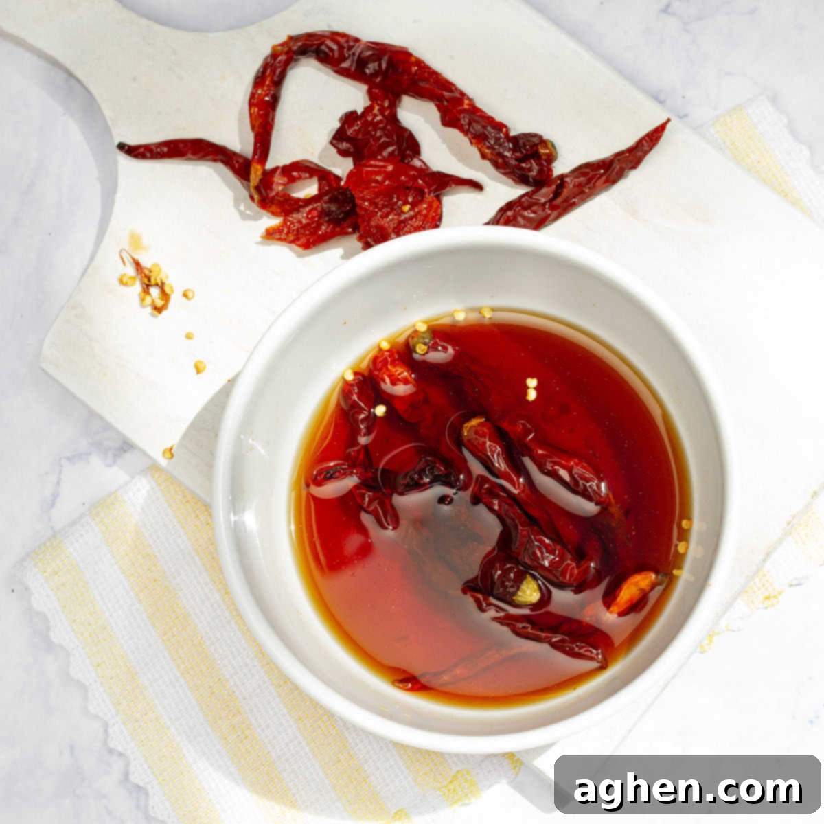 Light Pozole: All the Flavor, Less Guilt 5 Chiles rehydrating in a small bowl of water.