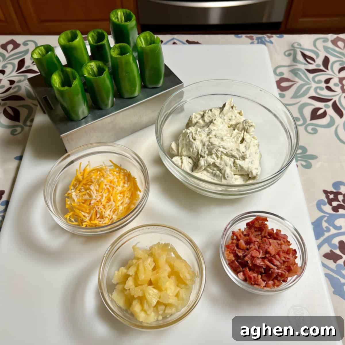 Competition BBQ Veteran's Smoked Bacon Wrapped Jalapeno Poppers 4 Mixing cream cheese, cheddar cheese, bacon, and pineapple filling in a bowl