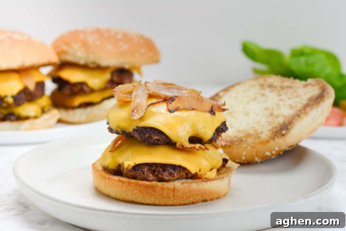 10 Sizzling Blackstone Dinners Perfect for Summer 2 smash burger on white plate