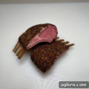 Perfectly Smoked Rack of Lamb, Surprisingly Simple 11 finished rack of lamb sliced in half