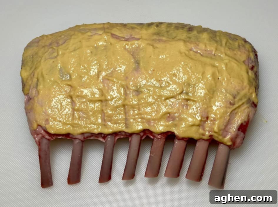 Perfectly Smoked Rack of Lamb, Surprisingly Simple 4 Rack of lamb coated with Dijon mustard