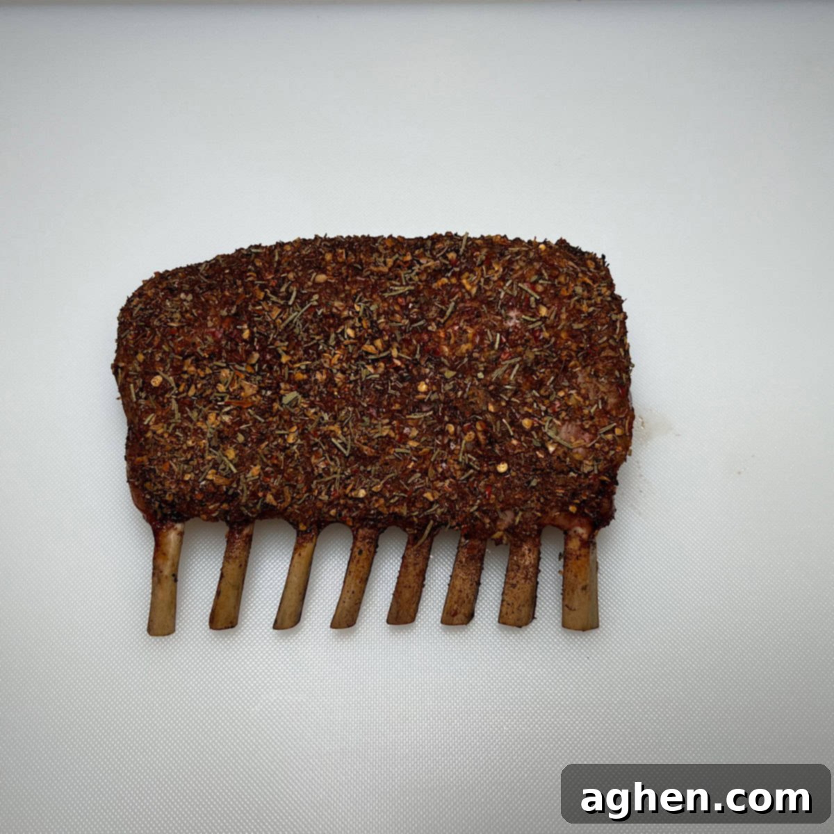 Perfectly Smoked Rack of Lamb, Surprisingly Simple 8 Close-up of perfectly cooked medium-rare smoked lamb chops