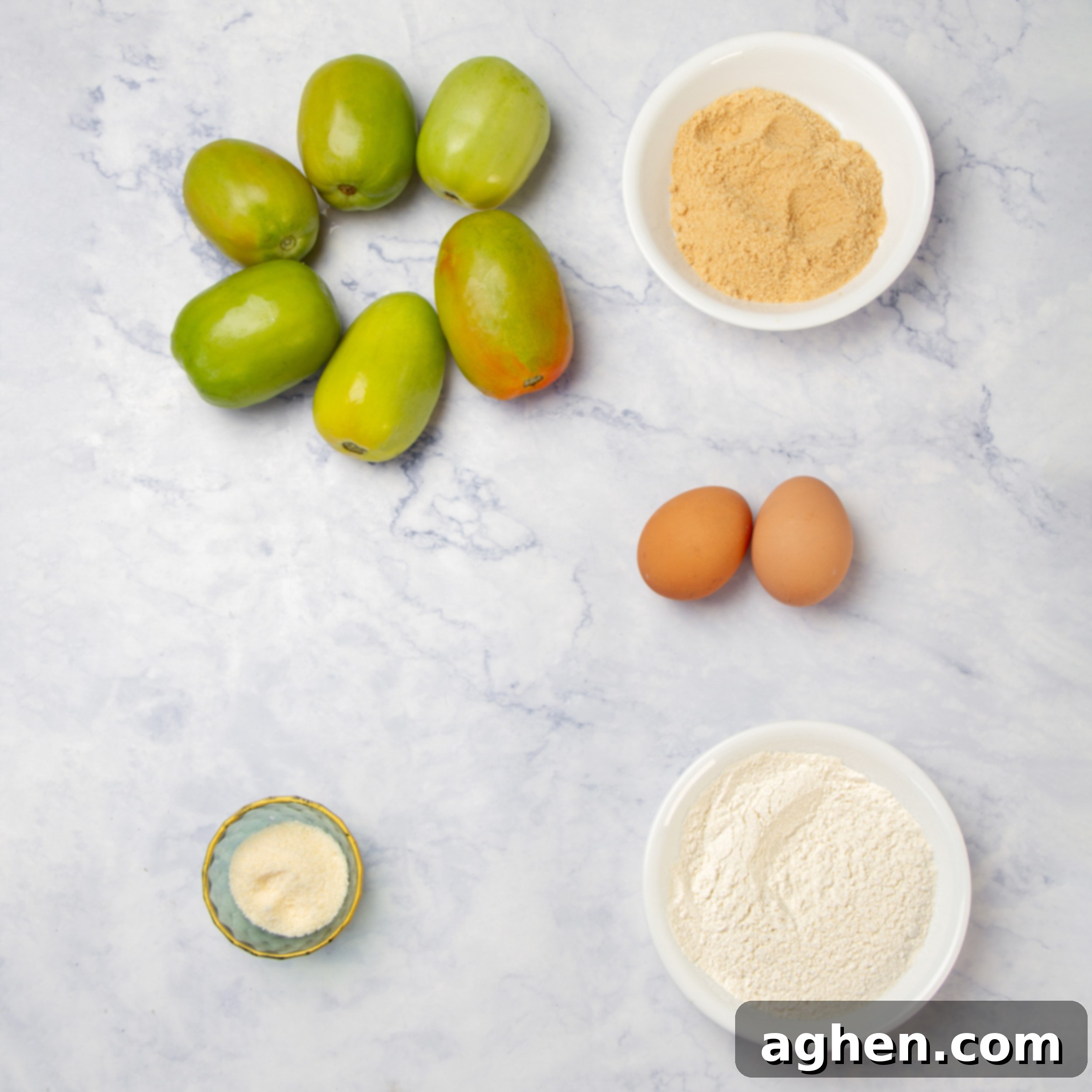 Golden Crispy Air-Fried Green Tomatoes 3 Ingredients for fried green tomatoes in separate dishes on a counter.