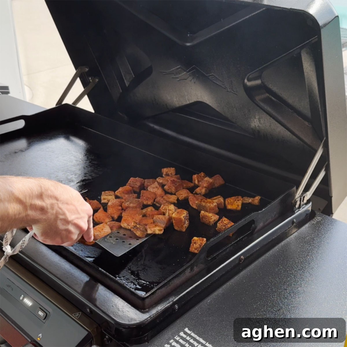 Unlock Delicious Griddle Salmon Bites 7 Salmon bites searing on a griddle