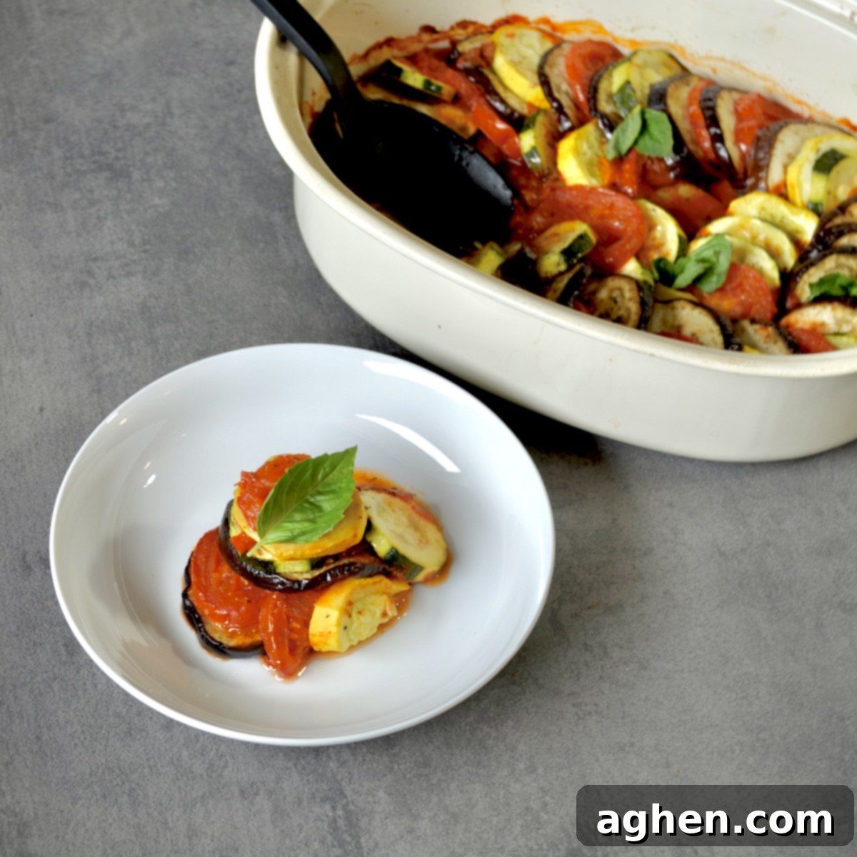 Late Summer Light Ratatouille Bake 7 Plated ratatouille with fresh basil garnish.