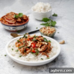 Comforting Slow Cooker Chicken Pumpkin Curry 7 Thick and fragrant Slow Cooker Chicken Pumpkin Curry in a dish over rice.