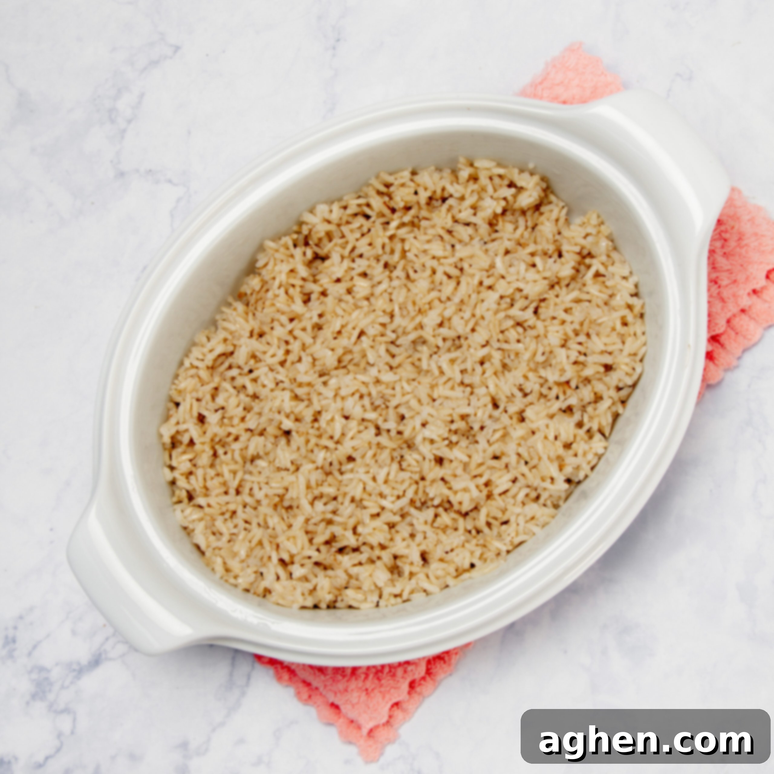 Fall Harvest Chicken Casserole A Weight Watchers Classic 5 Cooked brown rice in a casserole dish.