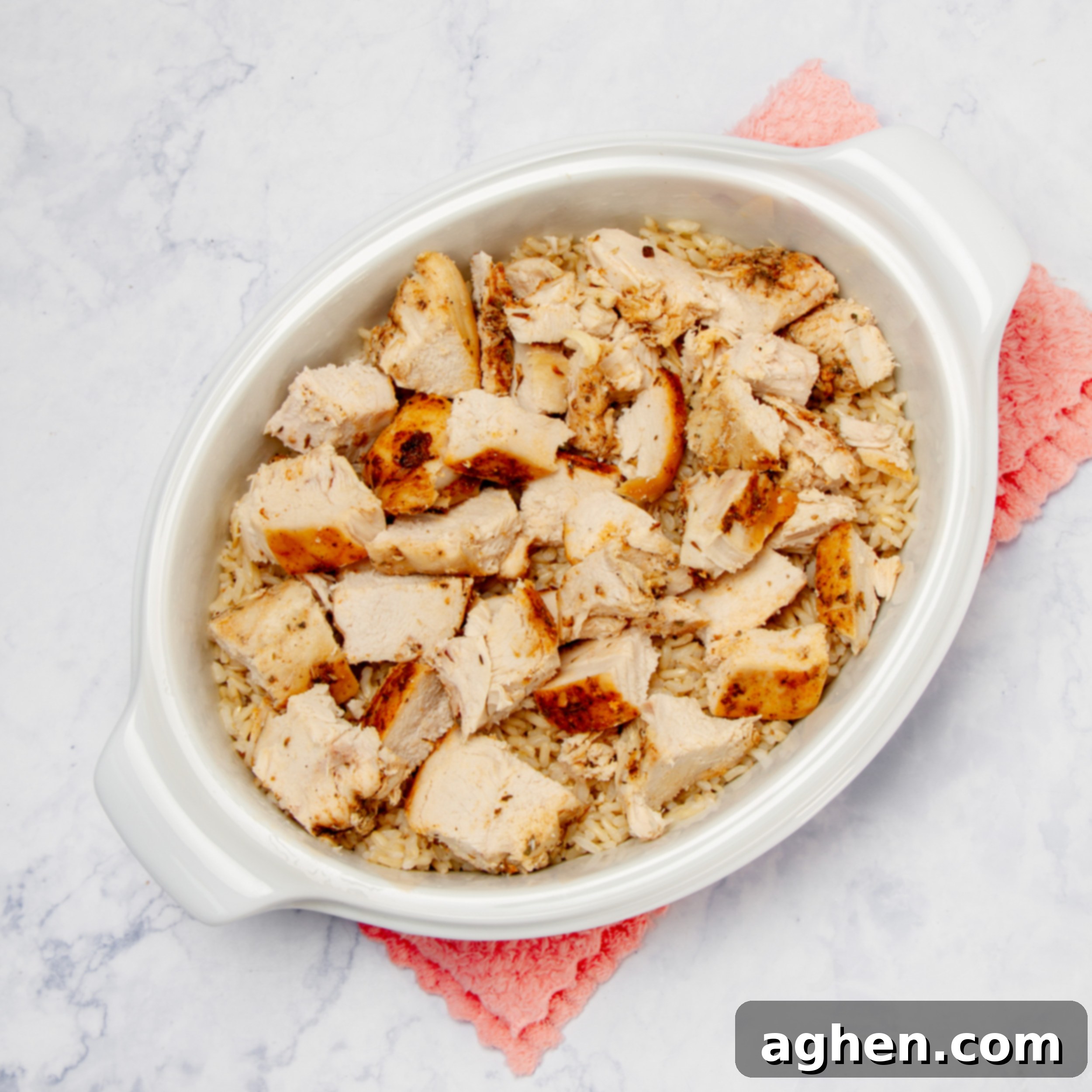 Fall Harvest Chicken Casserole A Weight Watchers Classic 6 Cooked chicken and brown rice in a casserole dish.