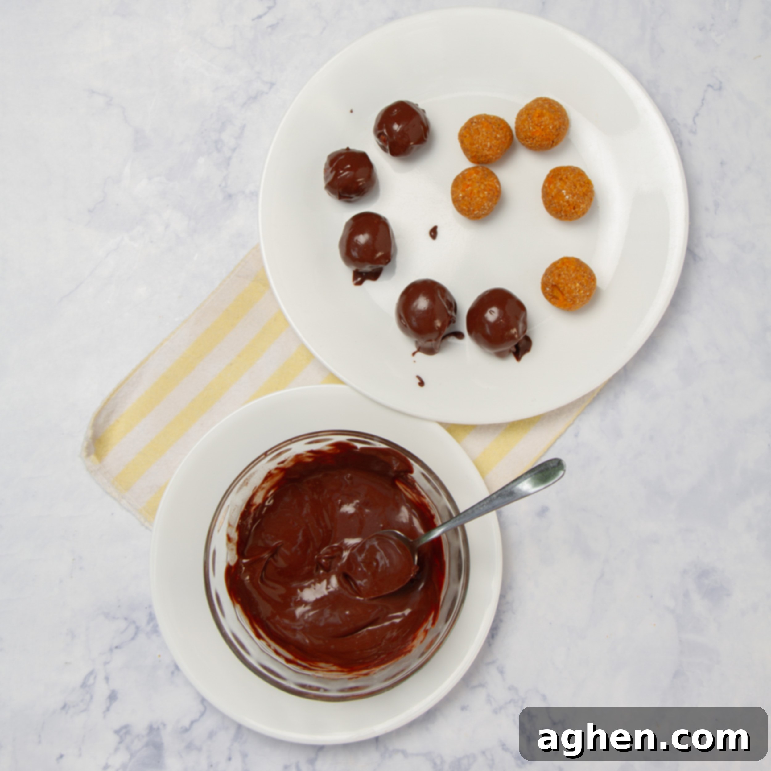 Weight Watchers Chocolate Pumpkin Truffles: The Ultimate Fall Treat 6 The rolled truffle balls being dipped into a small bowl of melted chocolate.