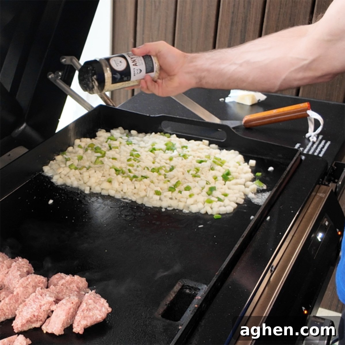 The Ultimate Griddle Breakfast Hash Recipe 5 Diced potatoes and vegetables cooking on the griddle, getting crispy and tender.