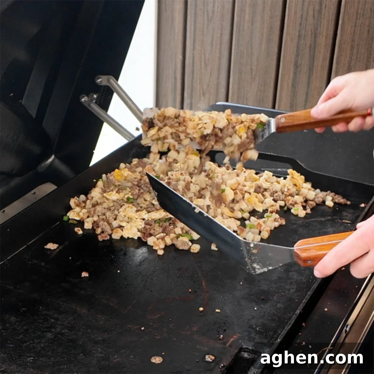 The Ultimate Griddle Breakfast Hash Recipe 7 Finished breakfast hash, a harmonious blend of crispy potatoes, savory sausage, colorful vegetables, and scrambled eggs, ready to be served.