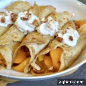 Golden Peach Crepes with Toasted Almond Crunch 7 Crepes with peach filling and whipped cream