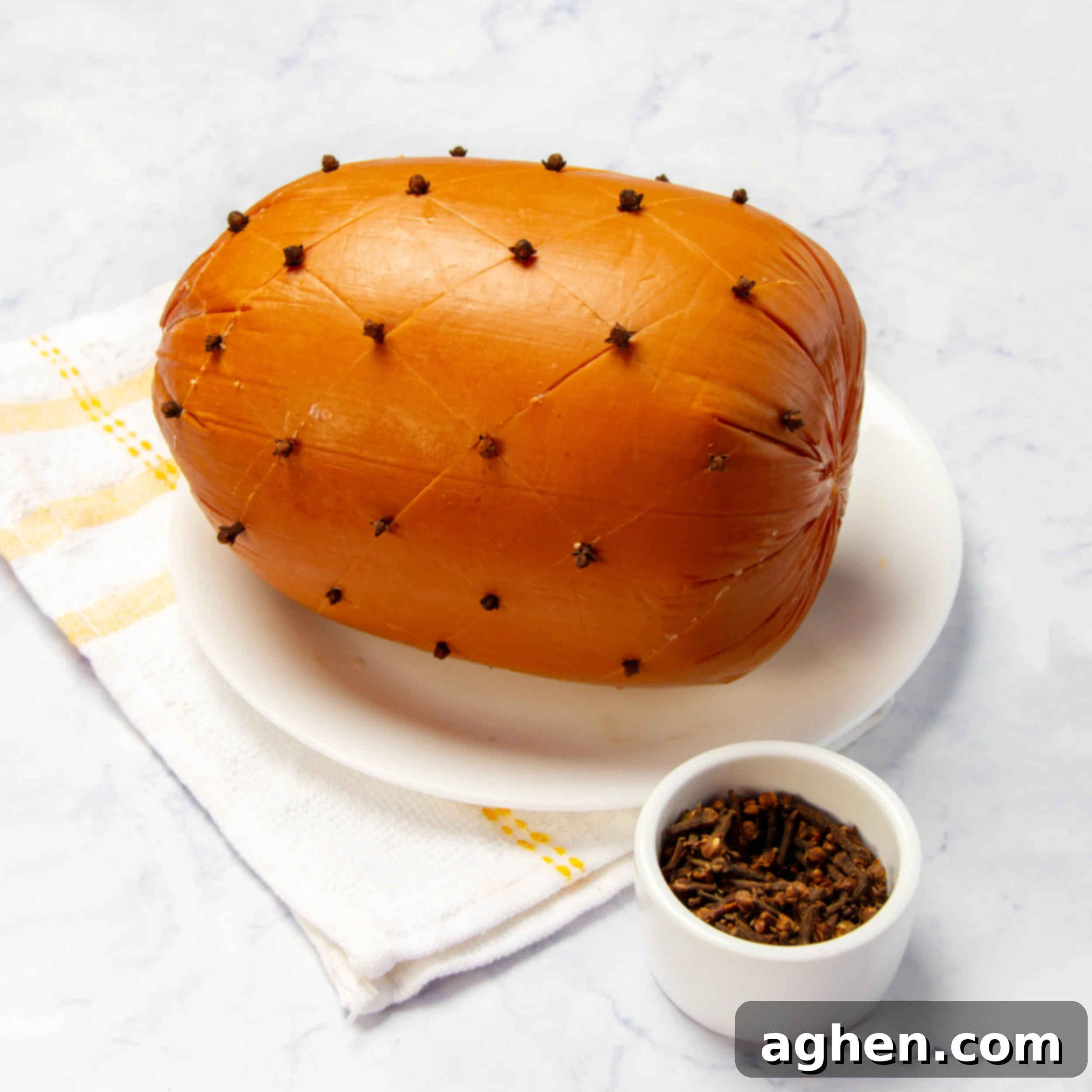 Weight Watchers Holiday Ham-Style Glazed Turkey 4 Cloves pushed into the exterior of the uncooked ham.