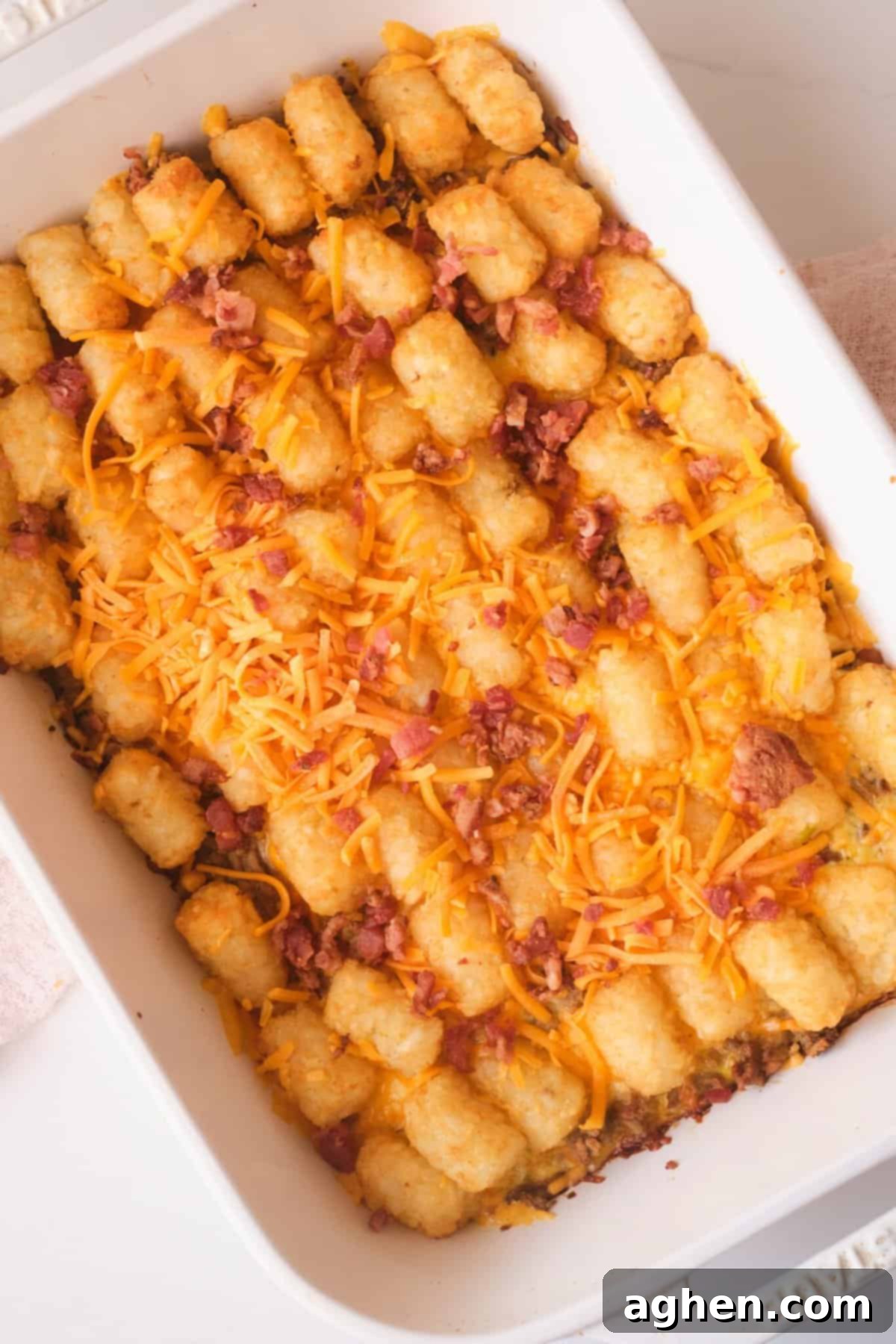Smart Start: Weight Watchers Breakfast Casseroles for Any Gathering 6 A hearty Tater Tot Breakfast Casserole topped with crispy tater tots and bacon crumble.