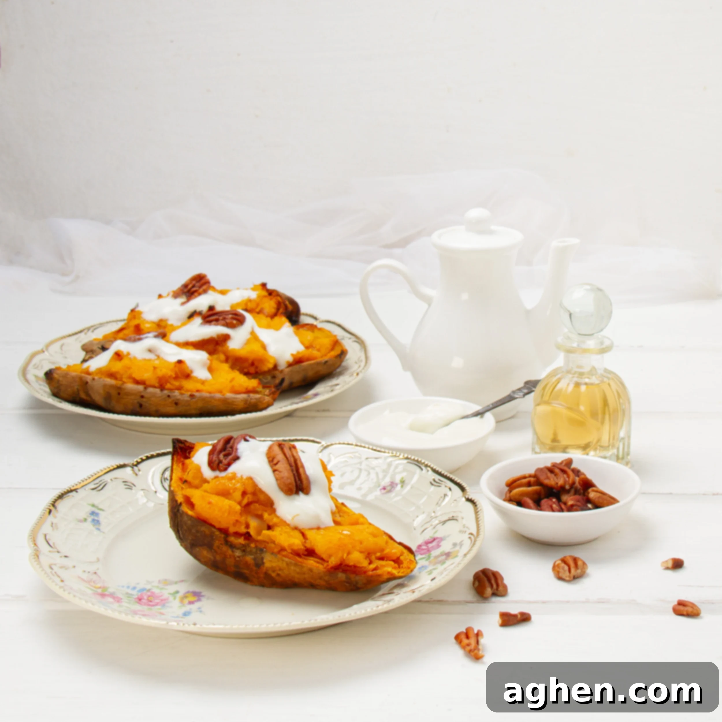 Ultimate Twice-Baked Sweet Potatoes 2 Twice baked sweet potatoes with pecan topping on a plate.