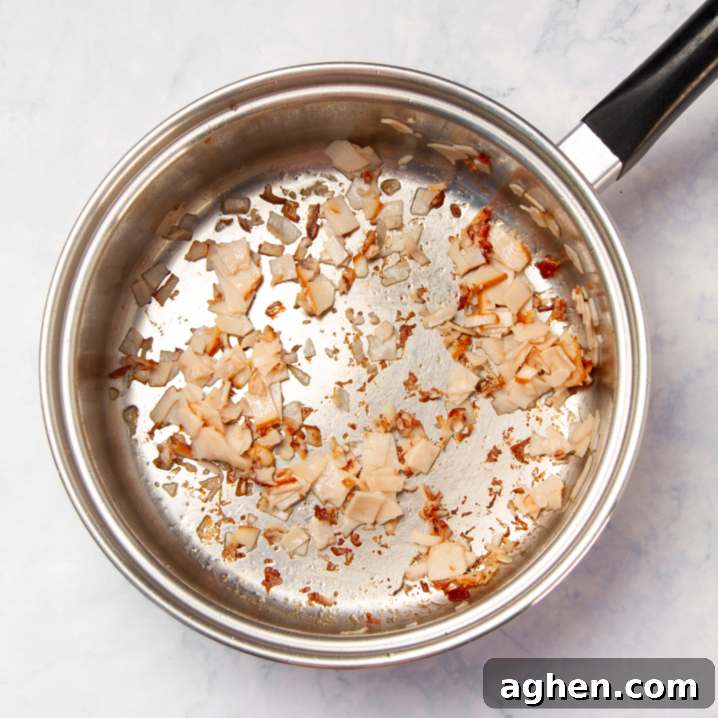 Ultimate Twice-Baked Sweet Potatoes 5 Turkey ham cooking in a pan.