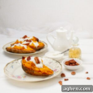 Ultimate Twice-Baked Sweet Potatoes 8 Twice-baked sweet potatoes with pecan toping on a plate.