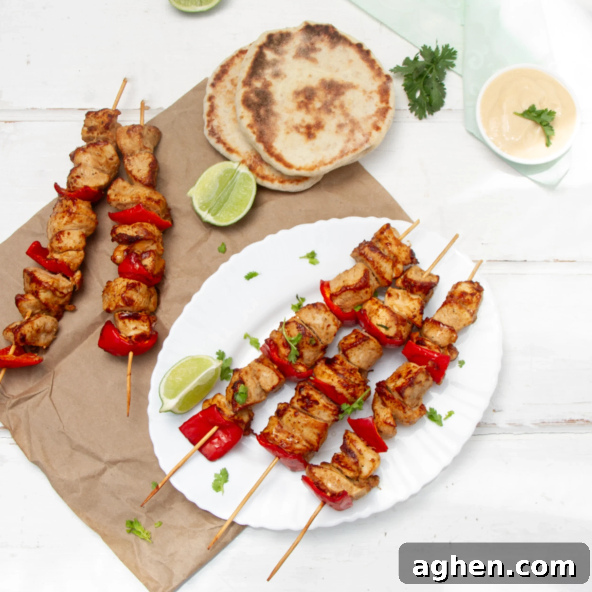 Flavorful Chicken Satay Skewers 2 Bold, Asian-inspired Chicken Satay Skewers on a plate, ready to be served.