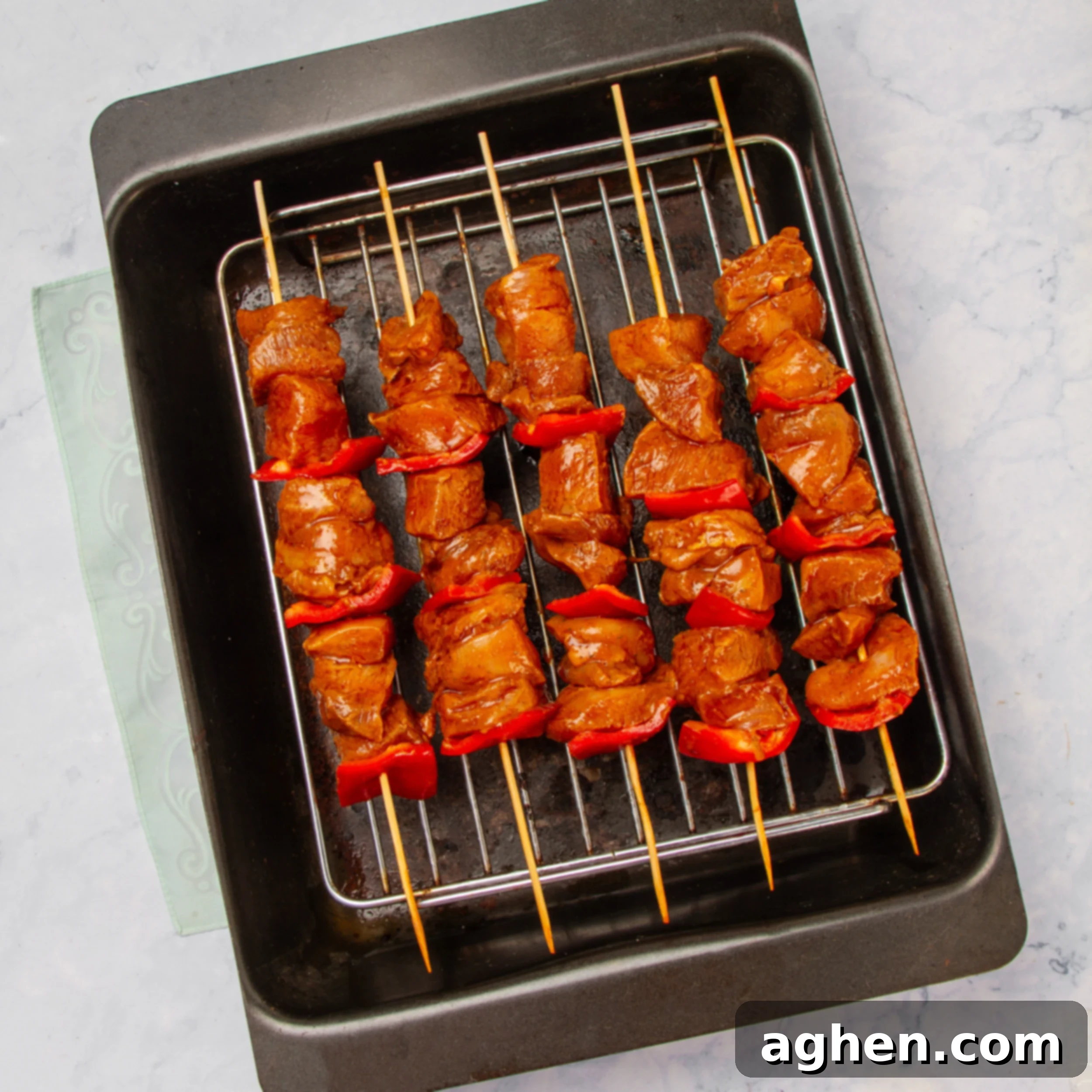 Flavorful Chicken Satay Skewers 6 Grilling the prepared chicken satay skewers over an open flame, achieving perfect char.