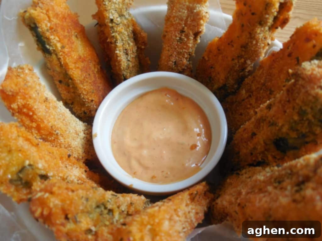 Kickin Ranch Zucchini Fries 7 Spicy Ranch Zucchini Fries piled on a plate, ready to be served