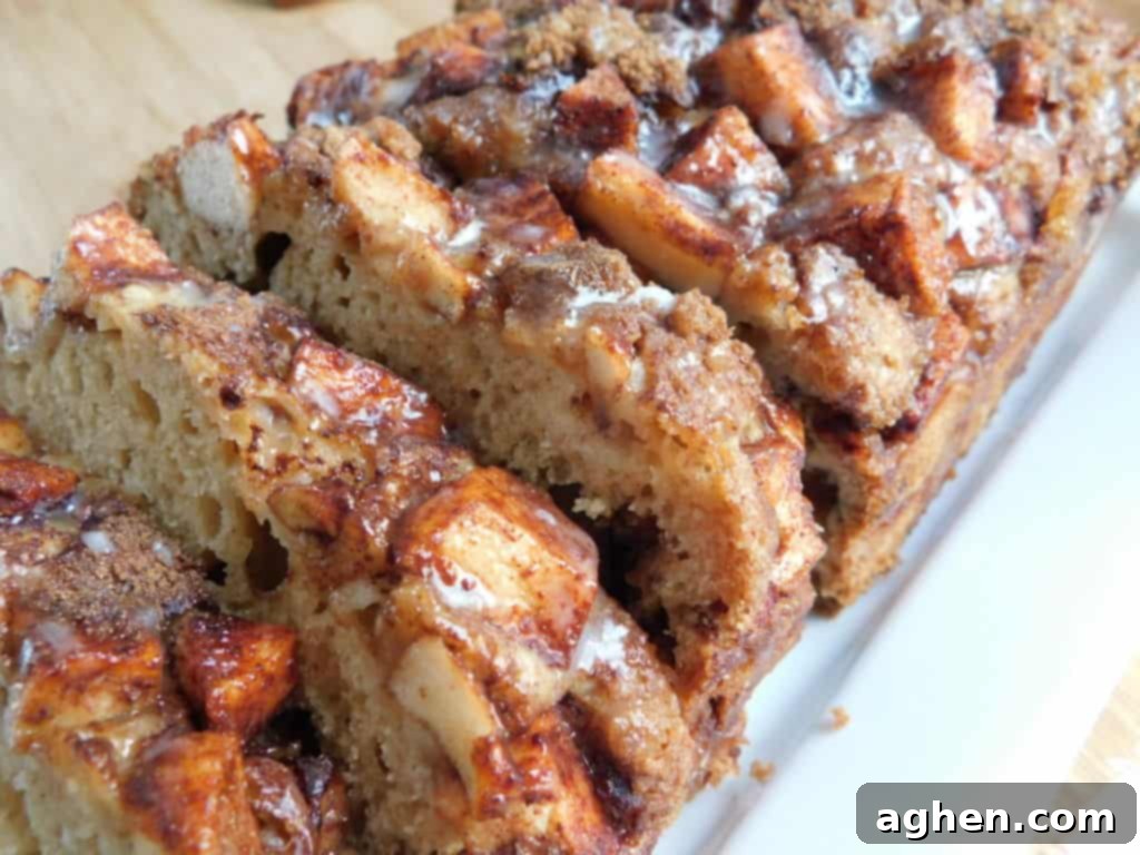 Cinnamon Swirl Apple Fritter Bread 5 Top view of the Apple Fritter Bread loaf with generous glaze drizzle